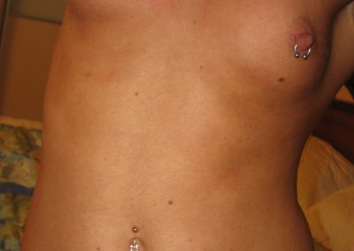 Girl Showing Pierced Nipple In pantyhose