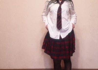 Girl In Schoolgirl Dress and Black pantyhose