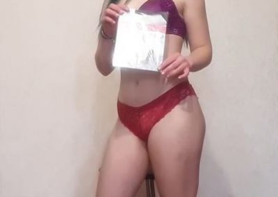 Girl Showing Brand of Pantyhose