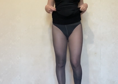 Sexy Brunette Lifting Skirt Showing Panties and Pantyhose