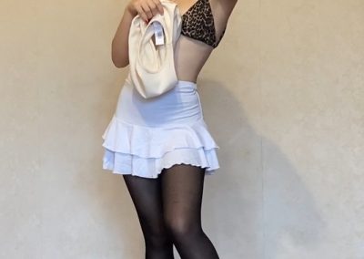 Girl In Bra and White Skirt and Black Pantyhose