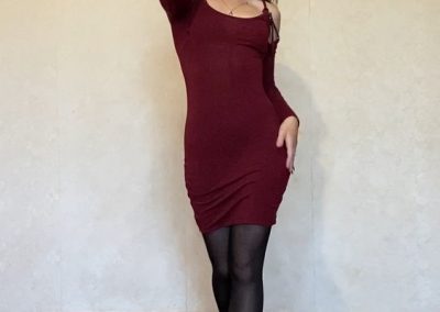 Brunette In Red Dress and Pantyhose