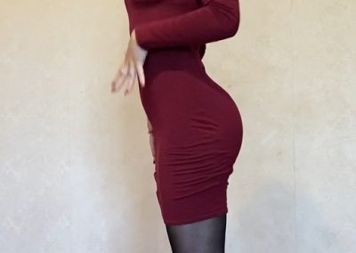 Sideview of Crystal in Skirt and Pantyhose