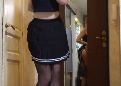 Girl Lifting Skirt To Show Pantyhosed Ass