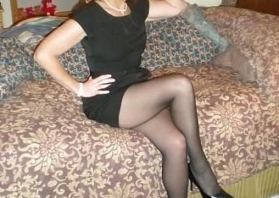 Brunette Milf In Short Black Dress Crossing Legs Black Pantyhose