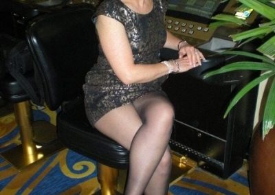 Mature Black Hair Woman In Short Dress Wearing Pantyhose