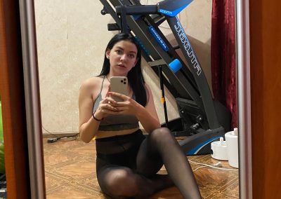 Amber on the floor in black pantyhose selfie