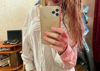 Nerdy girl in dress shirt sexy taking selfies