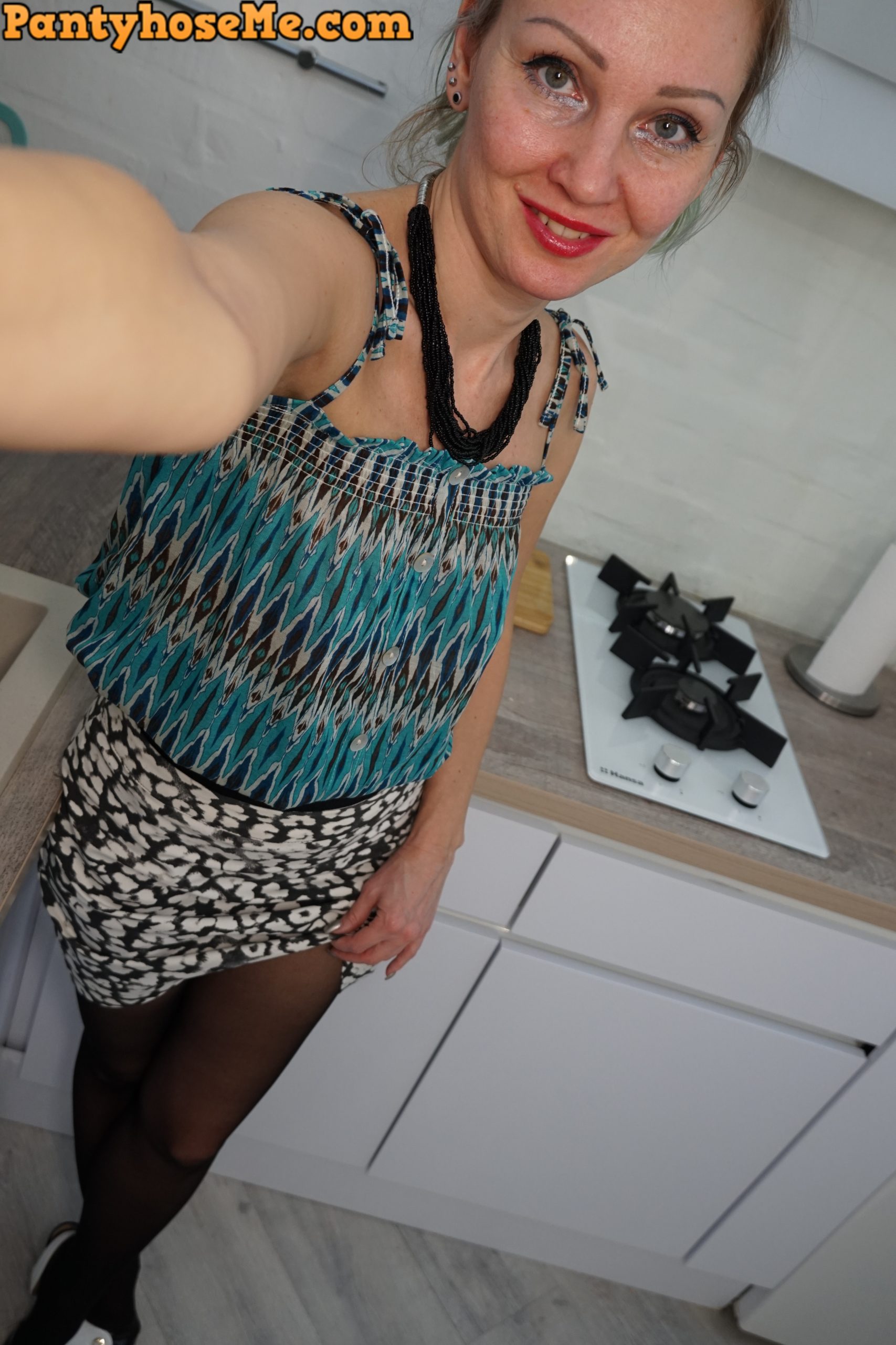 blonde milf dress selfie photo
