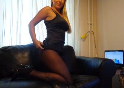 Milf pulled up skirt showing pantyhose legs