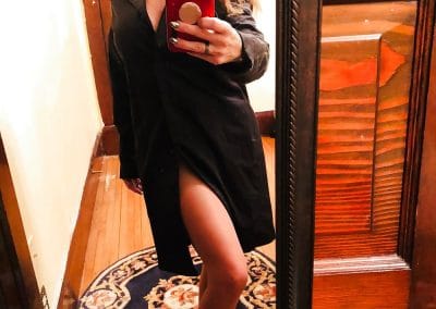 Beautiful Woman In Pantyhose Taking Selfie
