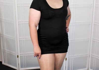 Brunette bbw in black miniskirt and nude pantyhose